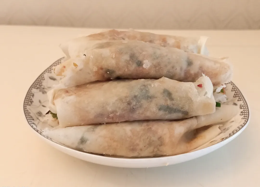 会理“薄片儿”与传统春卷有何不同？其制作有何独特之处？蕴含着怎样的人间温情？插图5