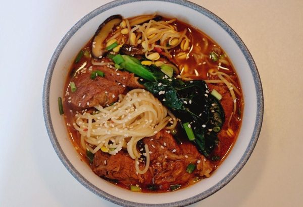 会东网美食专栏|番茄排骨面和花菜油豆腐炒鸡丁插图